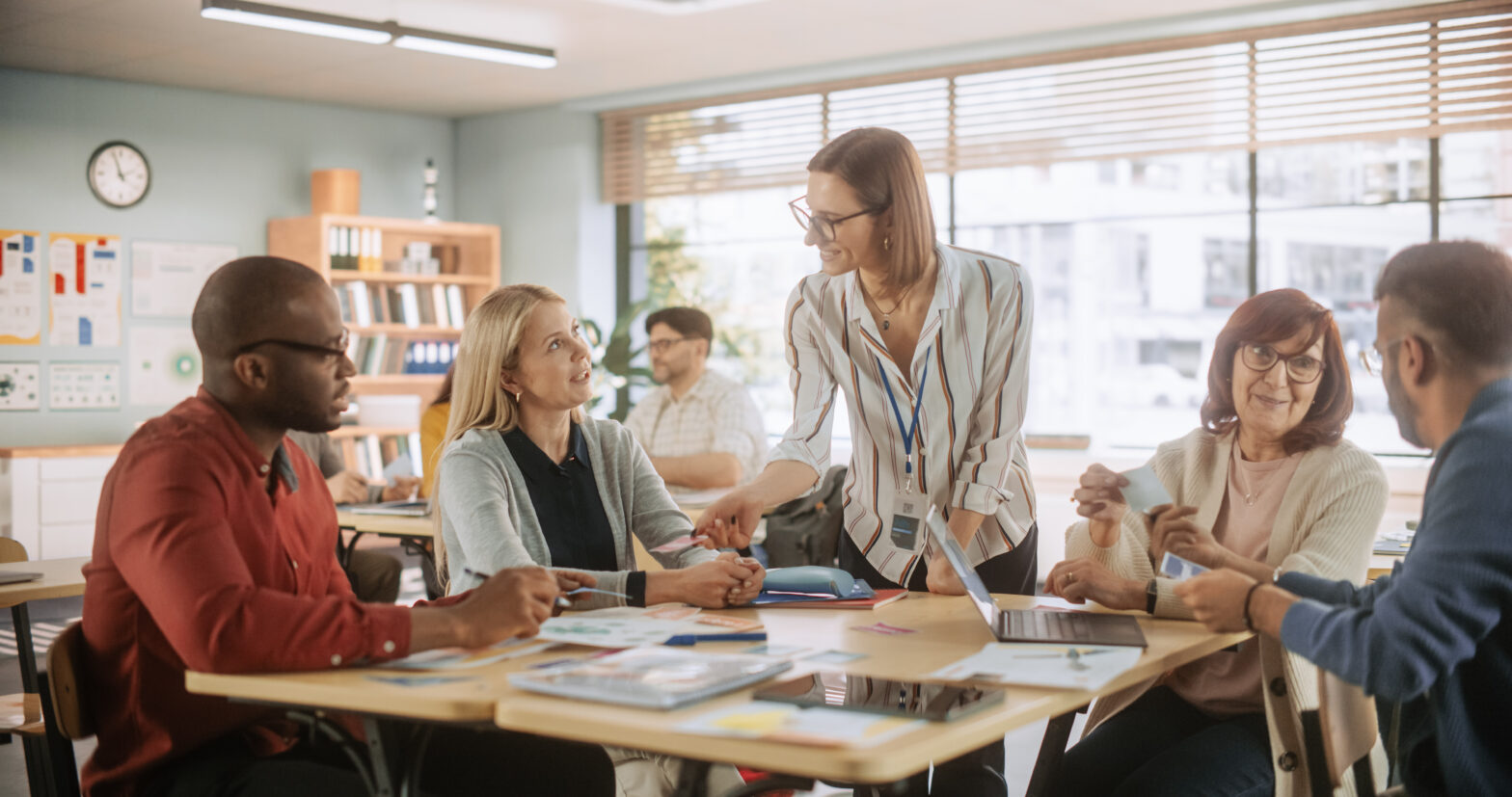Teachers talking in a classroom